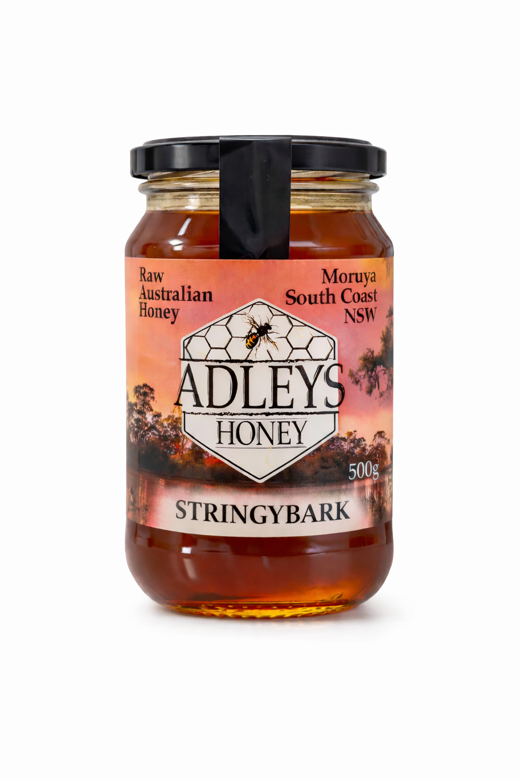 Jar of Adley's Honey with a pink label on a white background